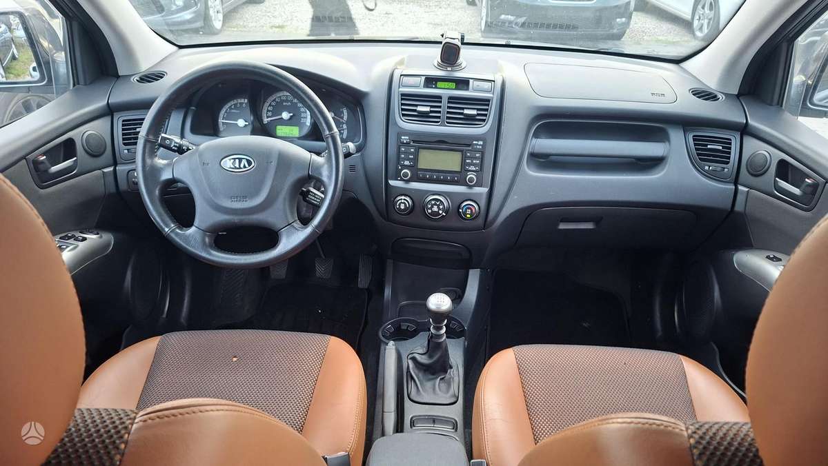 Kia Sportage 2010 — фото 12