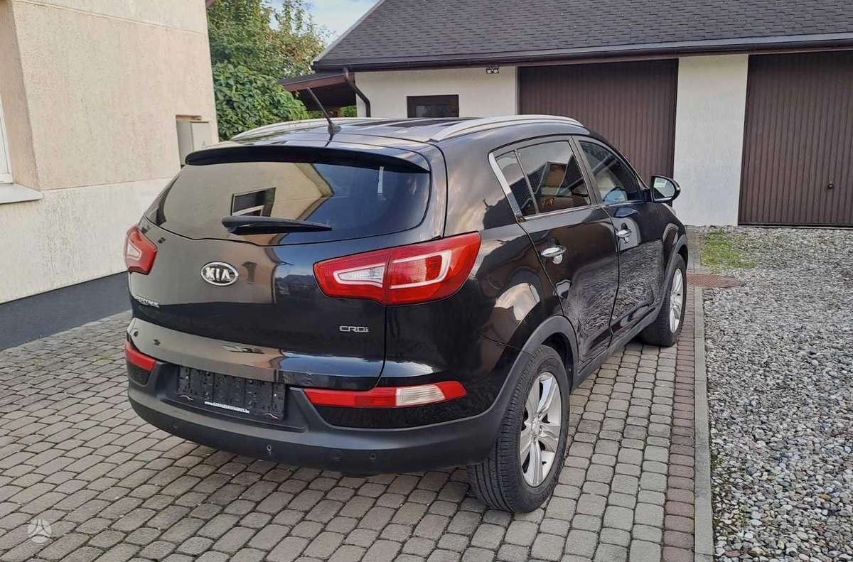 Kia Sportage 2011 — engine 1685 cm³, 116 HP (85kW)