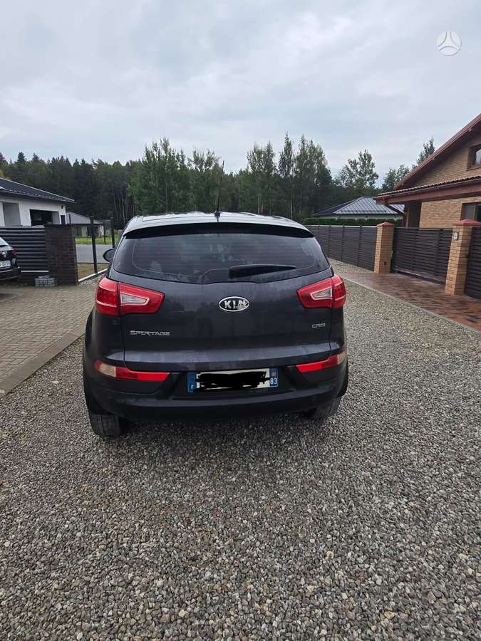 Kia Sportage 2012 — engine 1685 cm³, 116 HP (85kW)