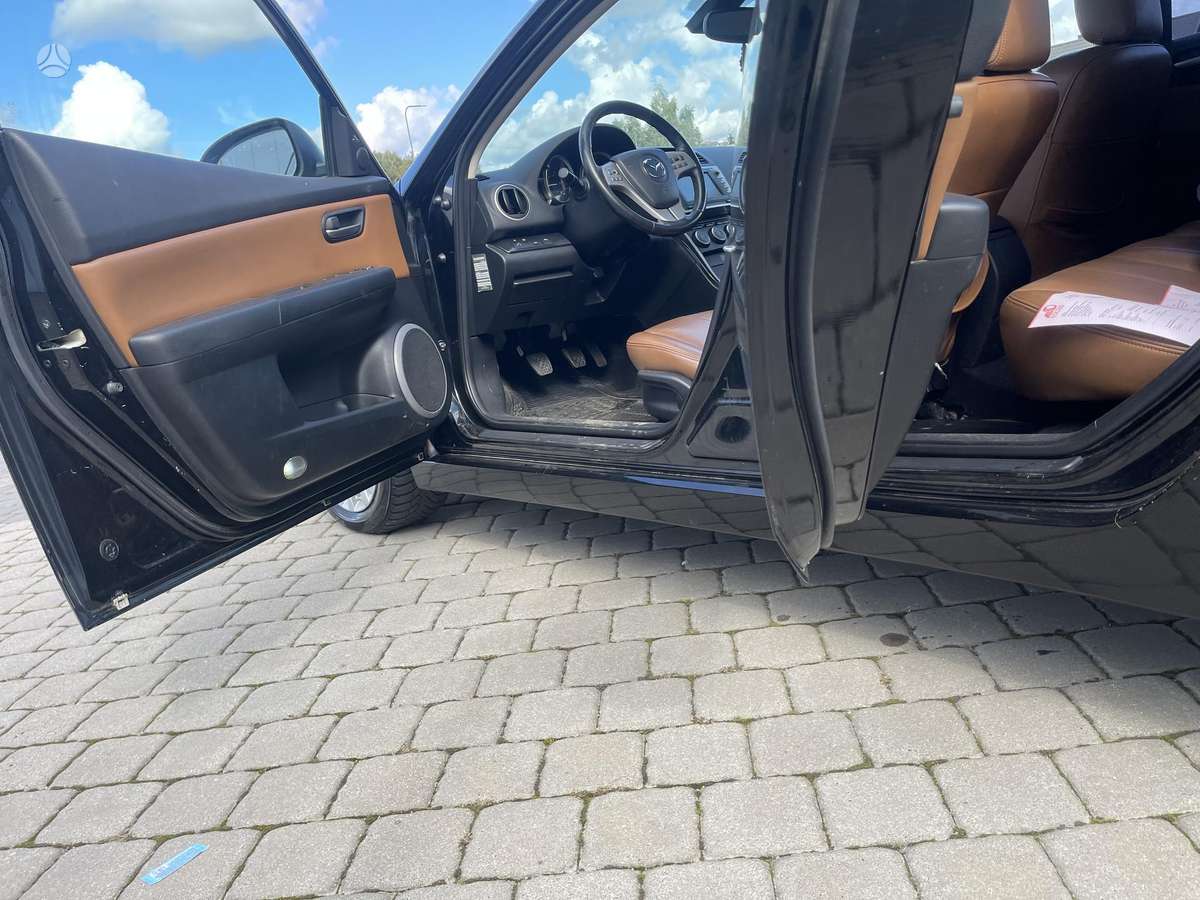 Mazda 6 2009 — photo 20