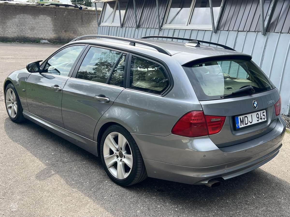BMW 318 2009 — engine 1995 cm³, 143 HP (105kW)