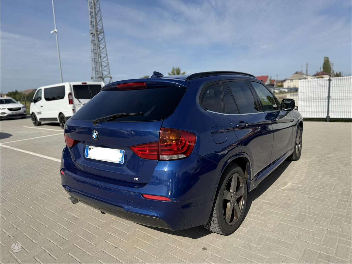 BMW X1 2011 — engine 1995 cm³, 204 HP (150kW)