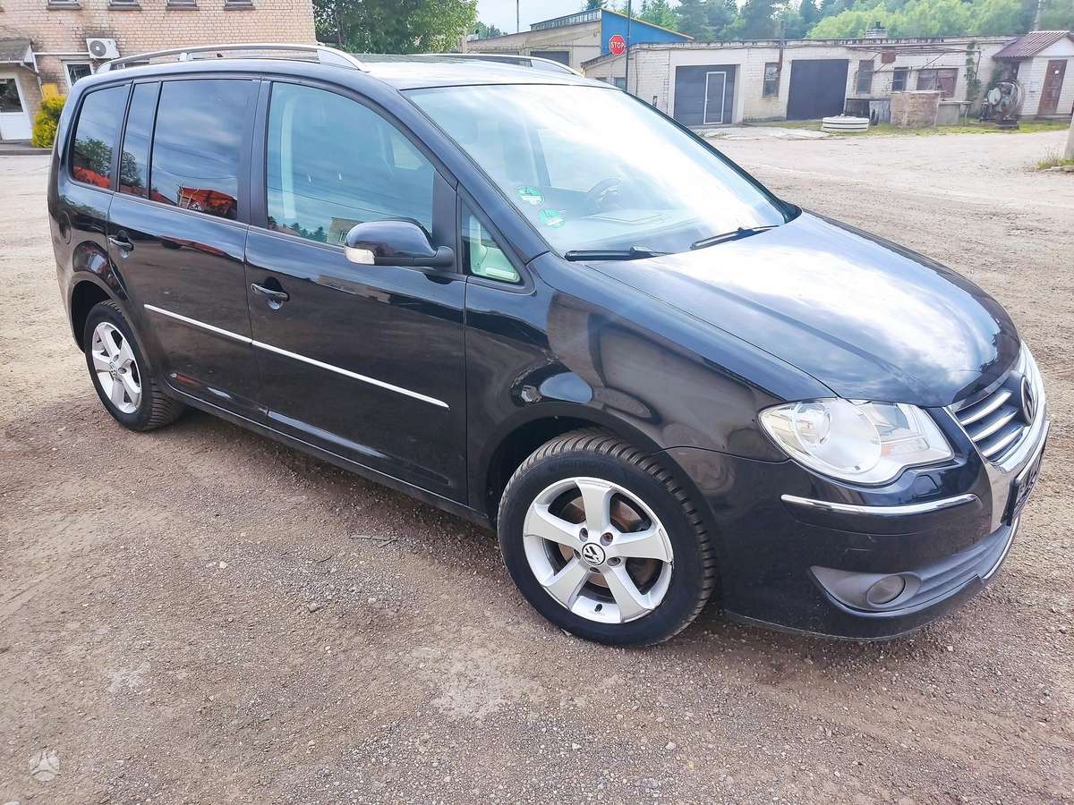 Volkswagen Touran 2009 — photo 13