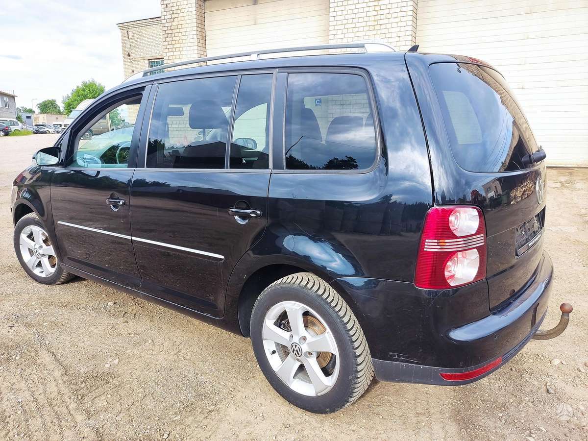 Volkswagen Touran 2009 — engine 1968 cm³, 140 HP (103kW)