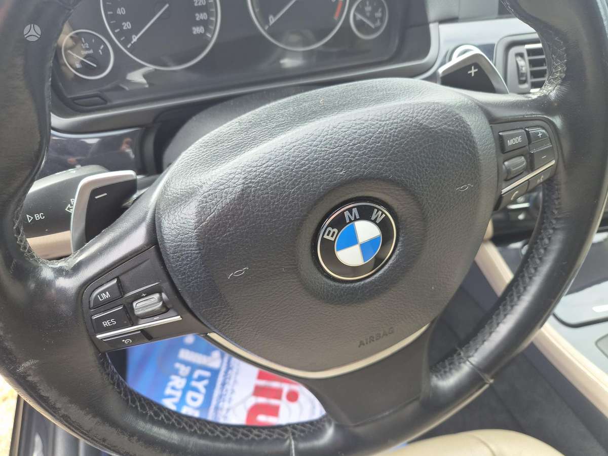 BMW 520 2011 — photo 16