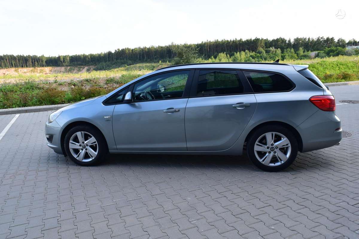 Opel Astra 2013 — engine 1956 cm³, 165 HP (121kW)