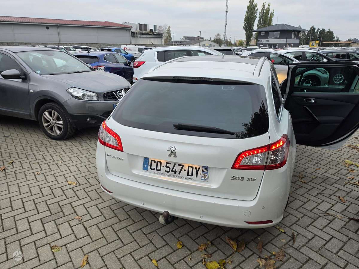 Peugeot 508 2012 — photo 14