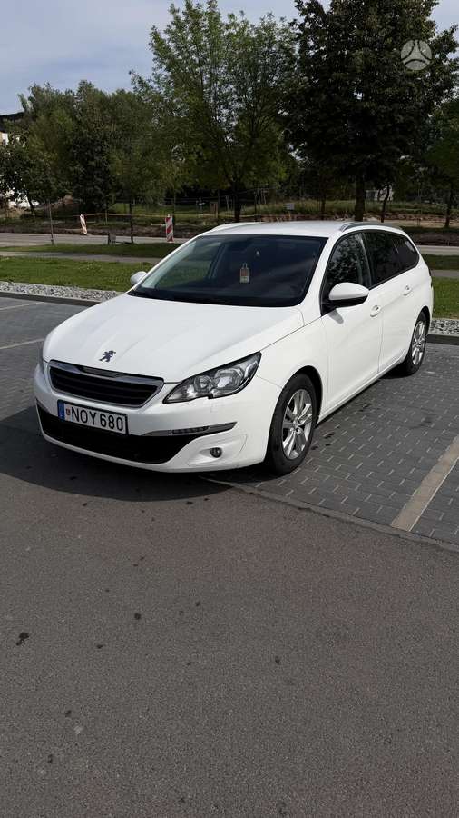 Peugeot 308 2015 — вигляд ззаду