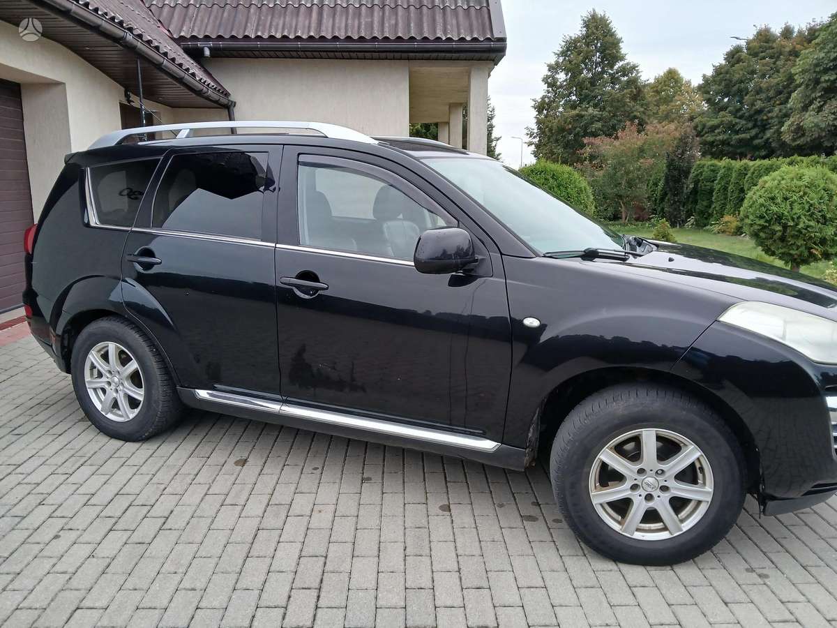 Peugeot 4007 2009 — rear view