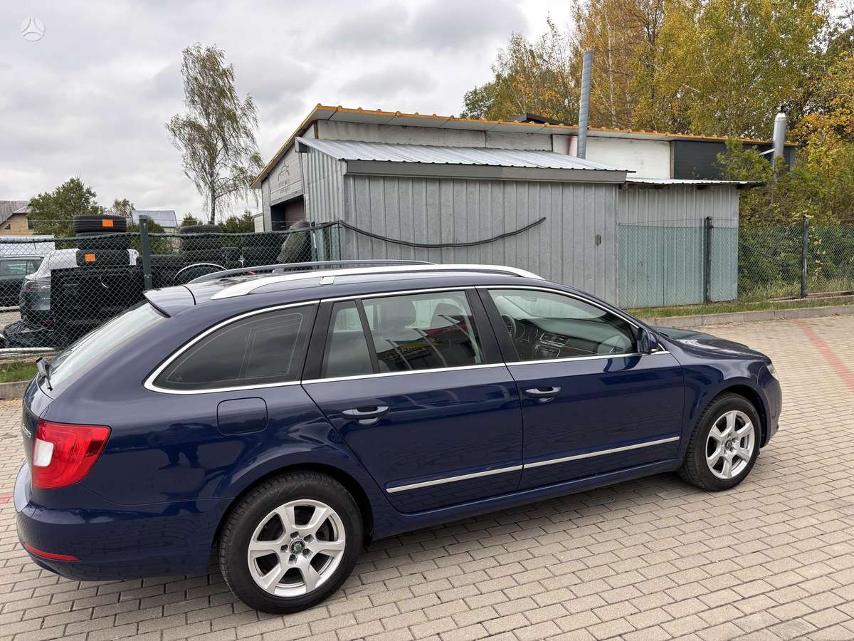 Skoda Superb 2011 — photo 16