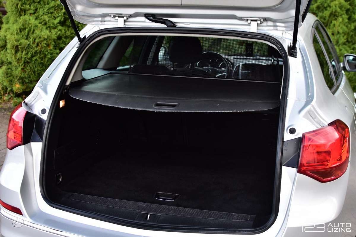 Opel Astra 2013 — фото 10