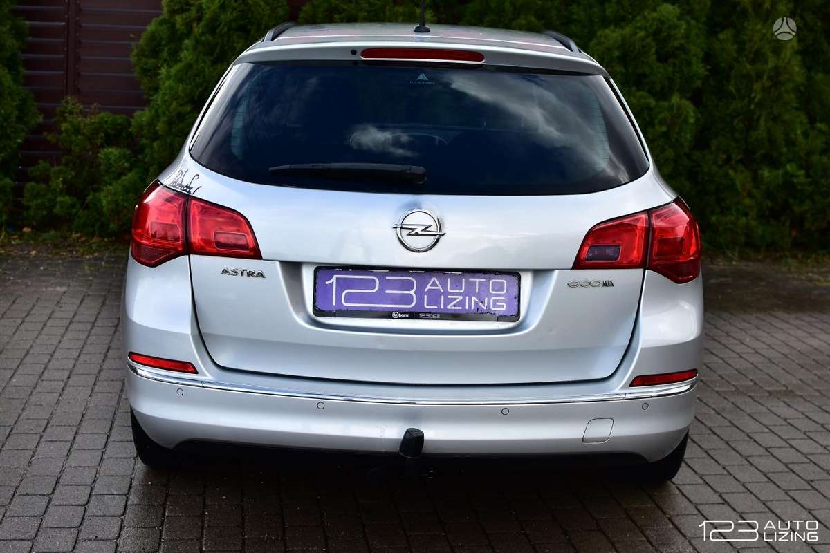 Opel Astra 2013 — фото 8