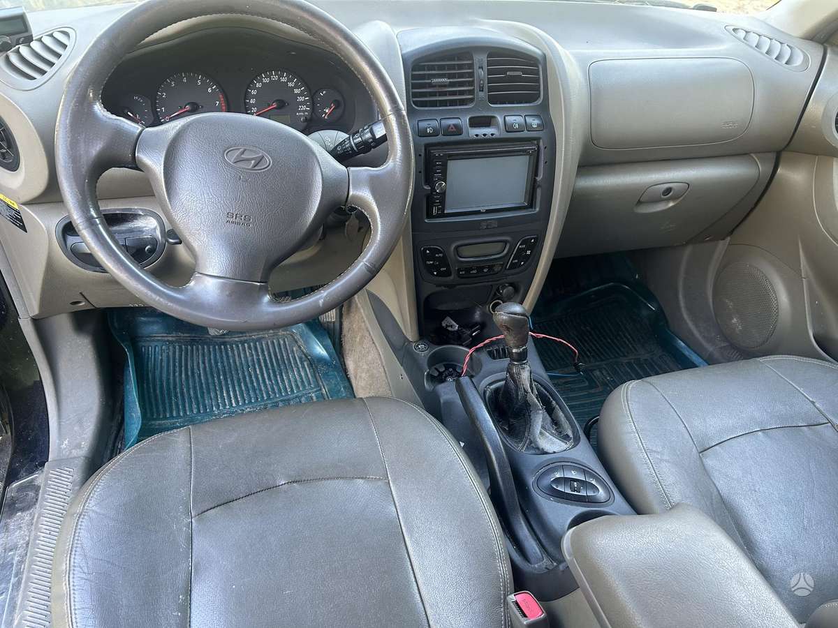 Hyundai Santa 2004 — photo 6