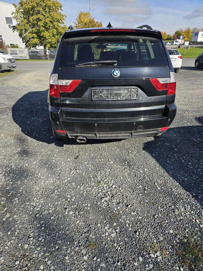 BMW X3 2010 — rear view