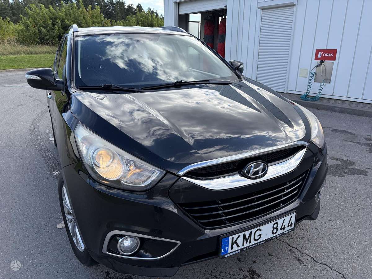 Hyundai ix35 2011 — photo 11