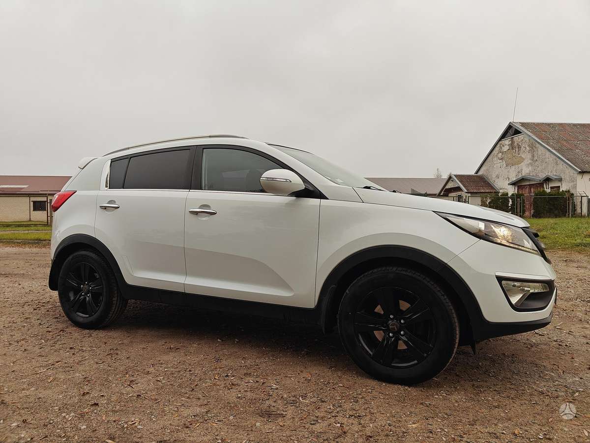 Kia Sportage 2011 — engine 1685 cm³, 116 HP (85kW)