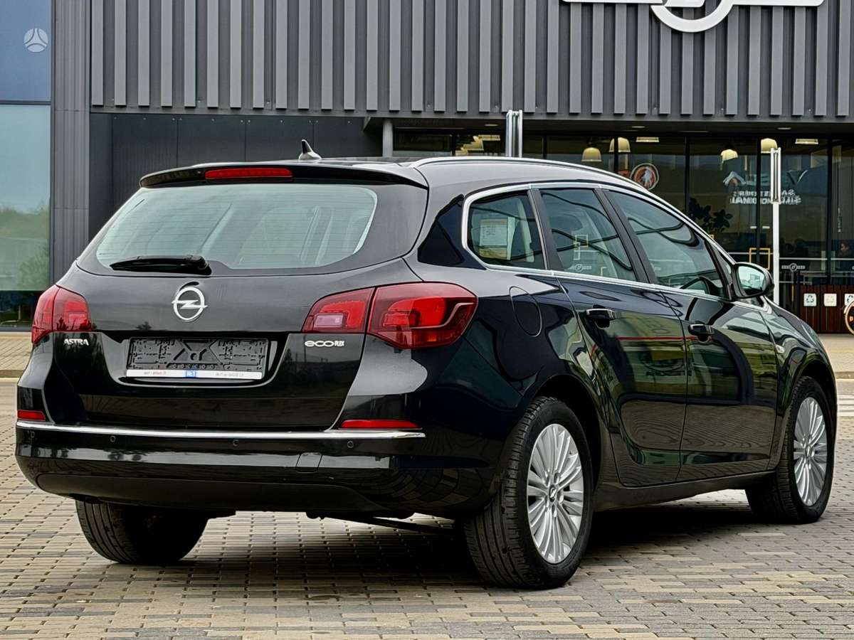 Opel Astra 2014 — фото 5