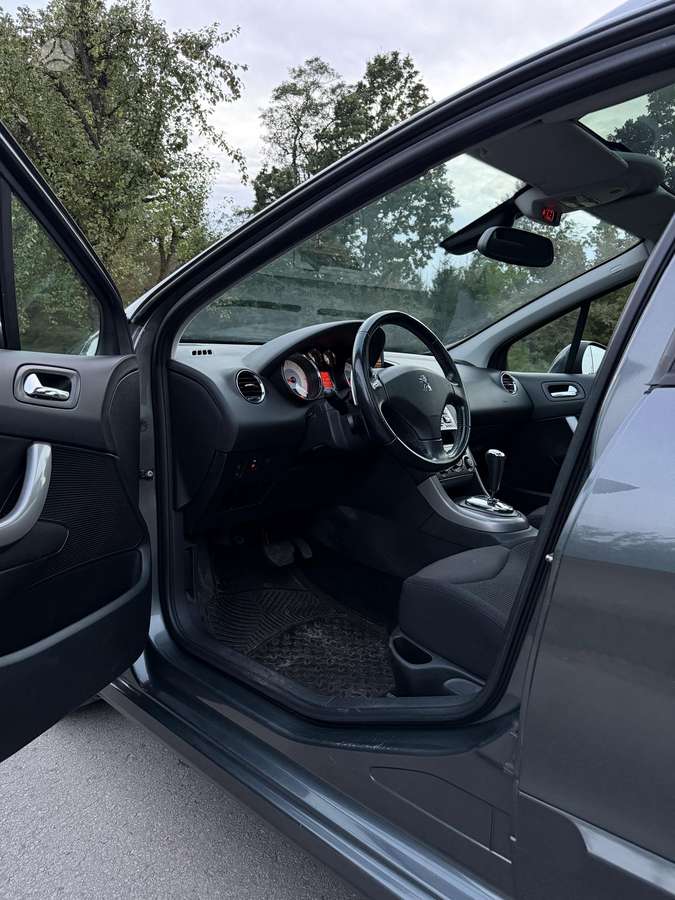 Peugeot 308 2012 — photo 19