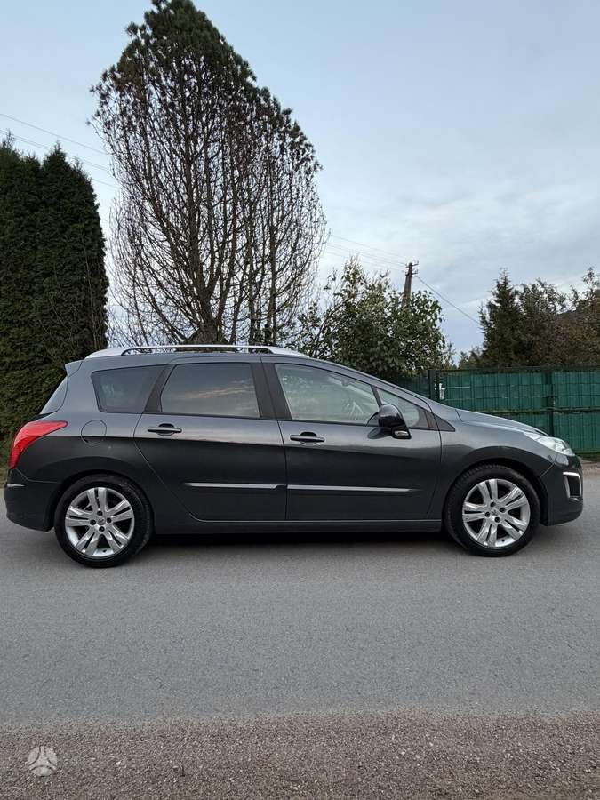 Peugeot 308 2012 — photo 8