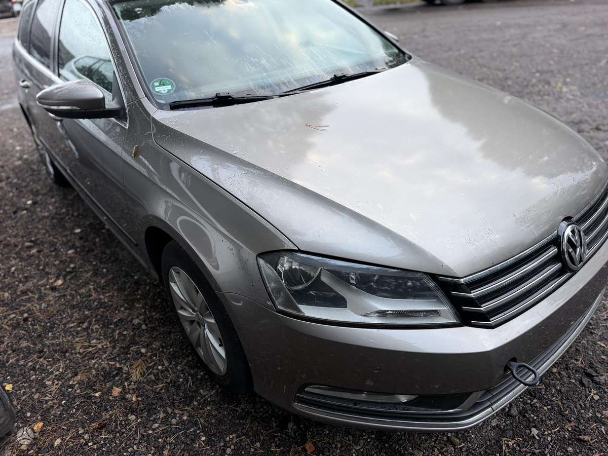 Volkswagen Passat 2011 — engine 2000 cm³, 105 HP (77kW)