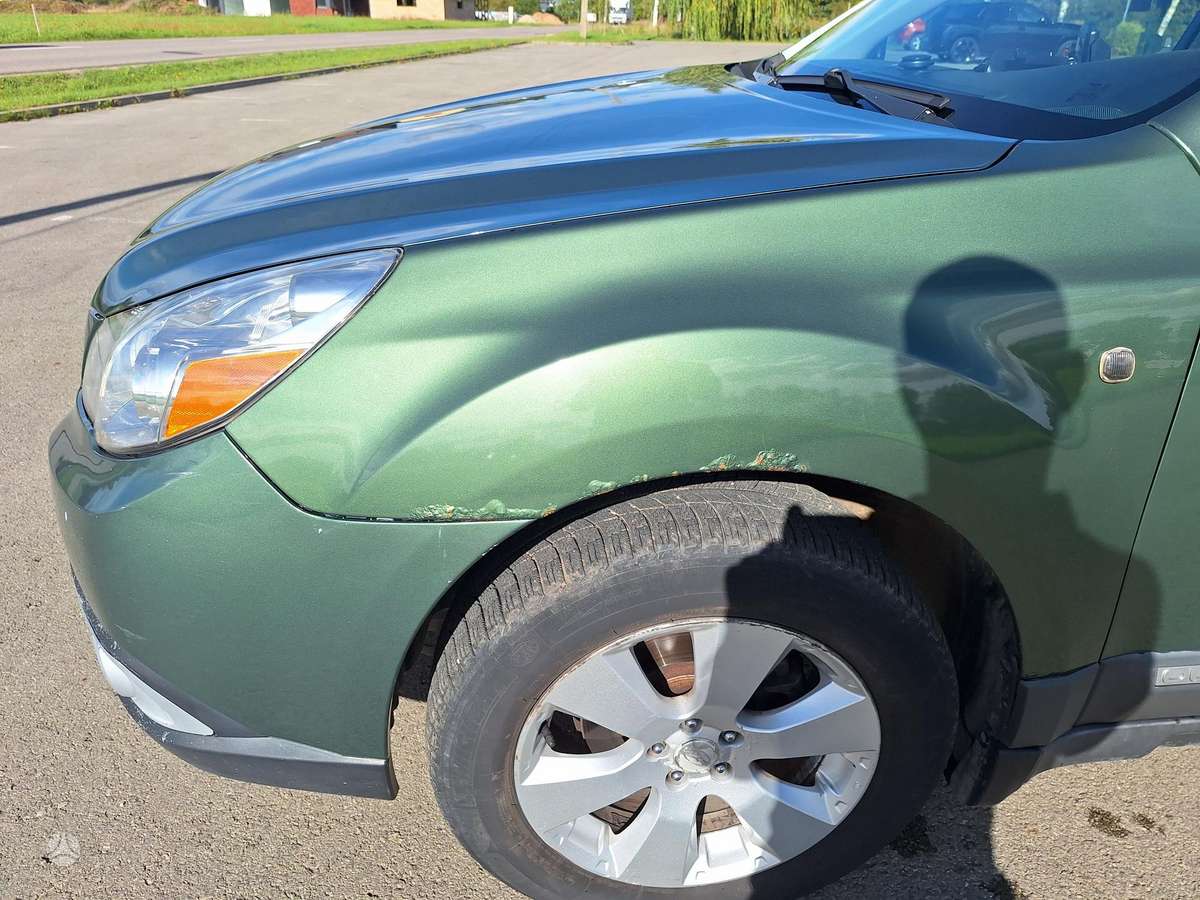 Subaru Outback 2011 — photo 11