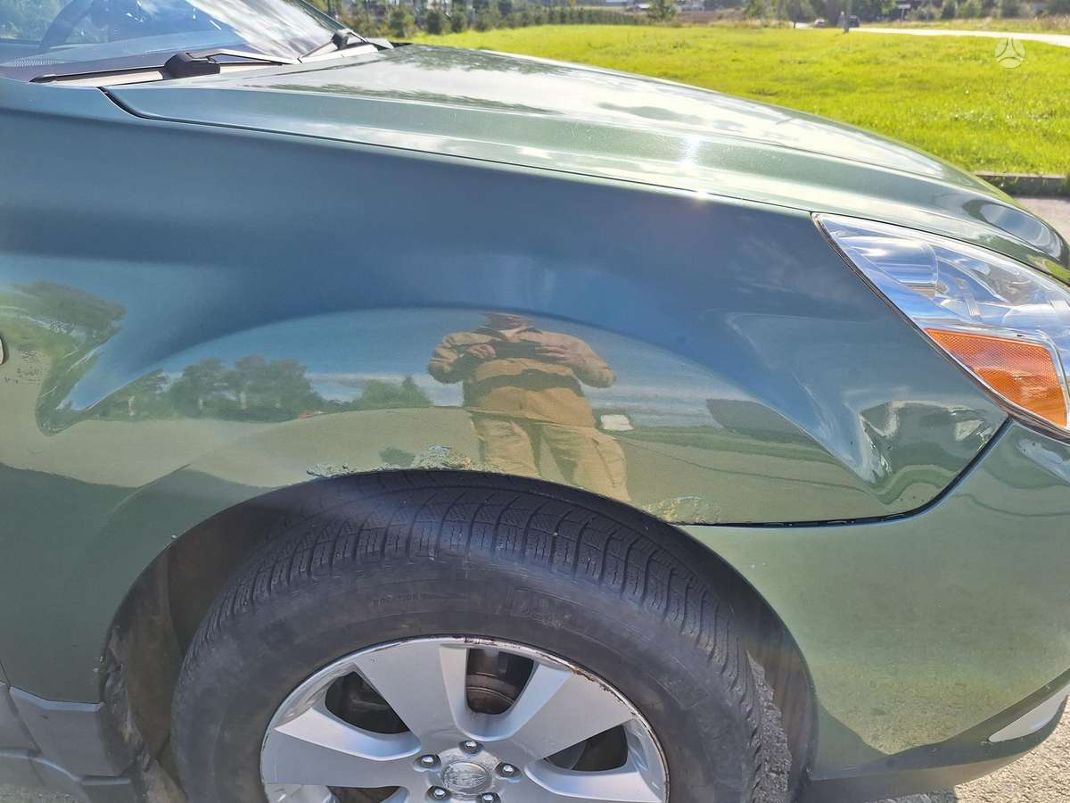 Subaru Outback 2011 — photo 12