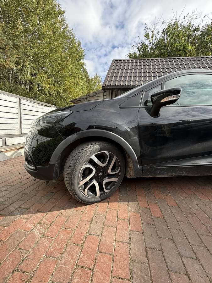 Renault Captur 2014 — вигляд ззаду