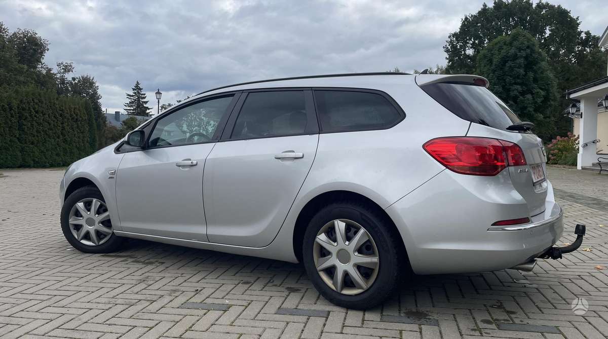 Opel Astra 2013 — фото 5