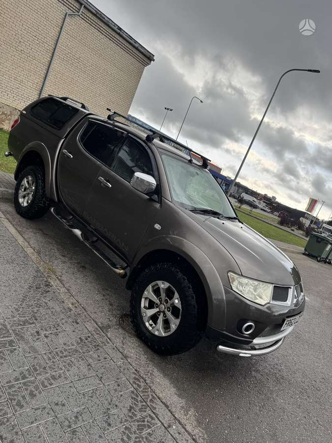 Mitsubishi L200 2013 — photo 5
