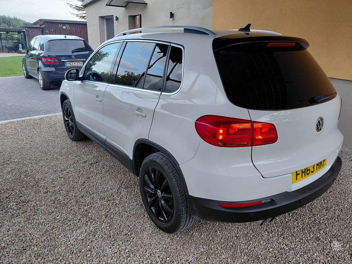 Volkswagen Tiguan 2014 — engine 1968 cm³, 140 HP (103kW)