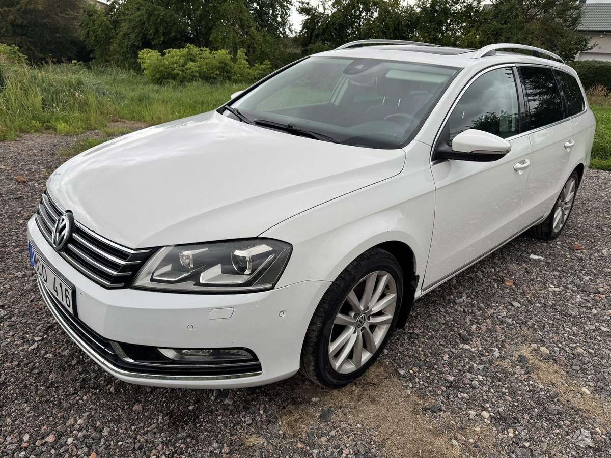 Volkswagen Passat 2014 — вигляд ззаду