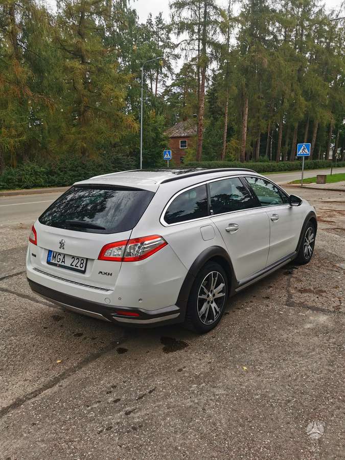 Peugeot 508 2014 — photo 16