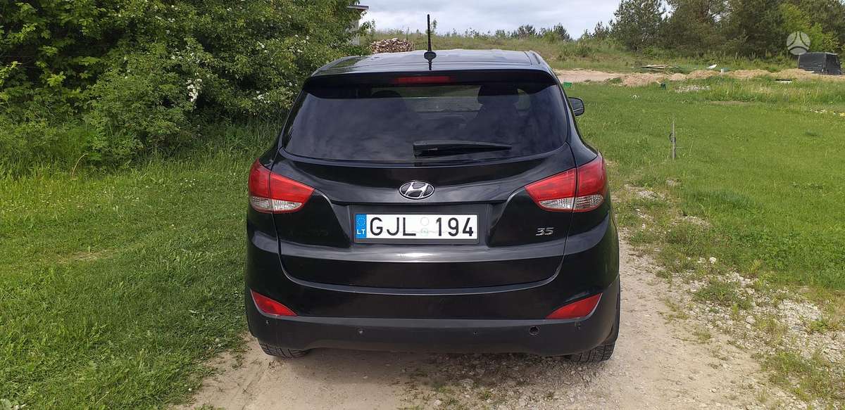 Hyundai Tucson 2012 — engine 1998 cm³, 165 HP (121kW)