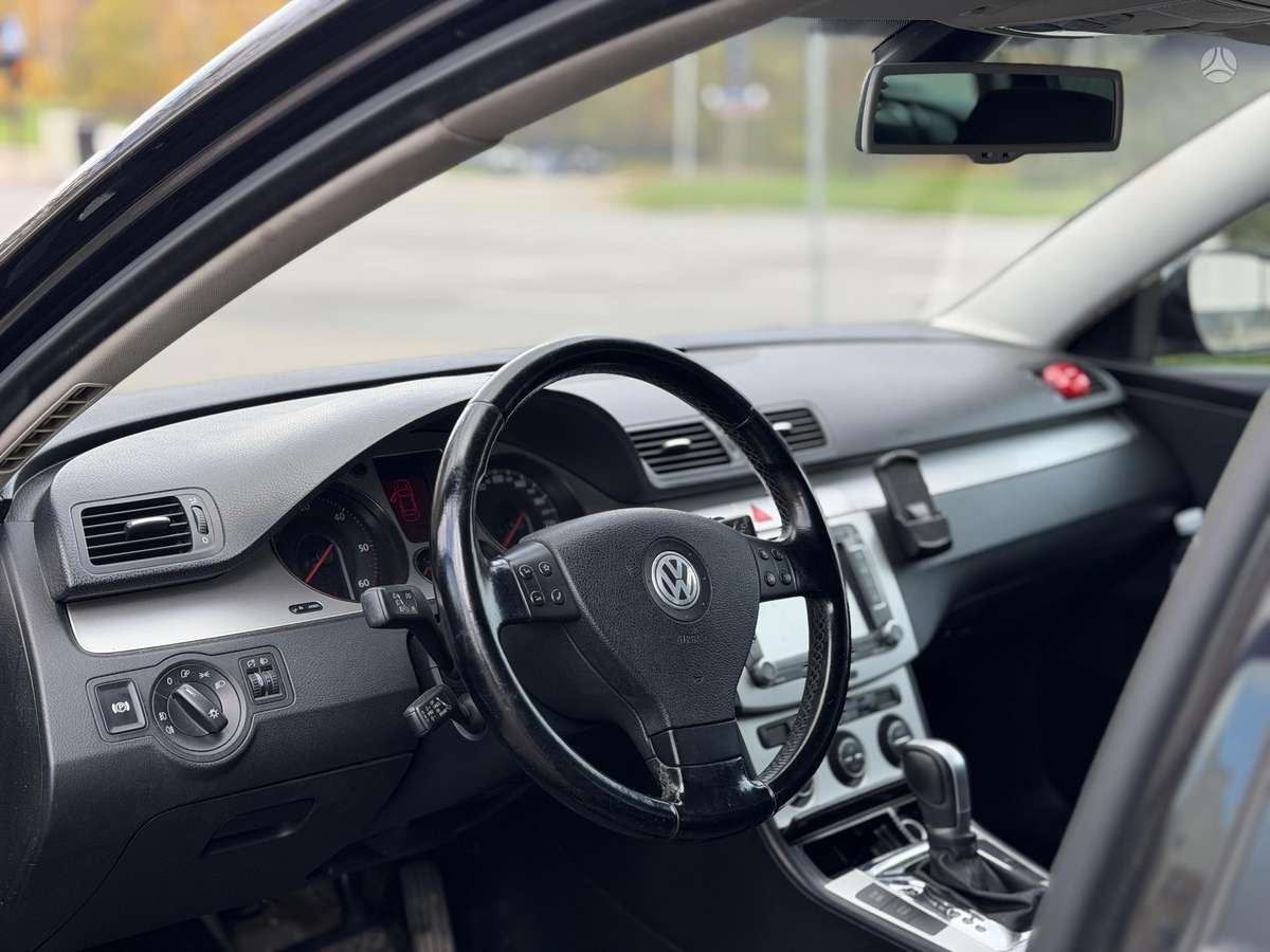 Volkswagen Passat 2009 — photo 14
