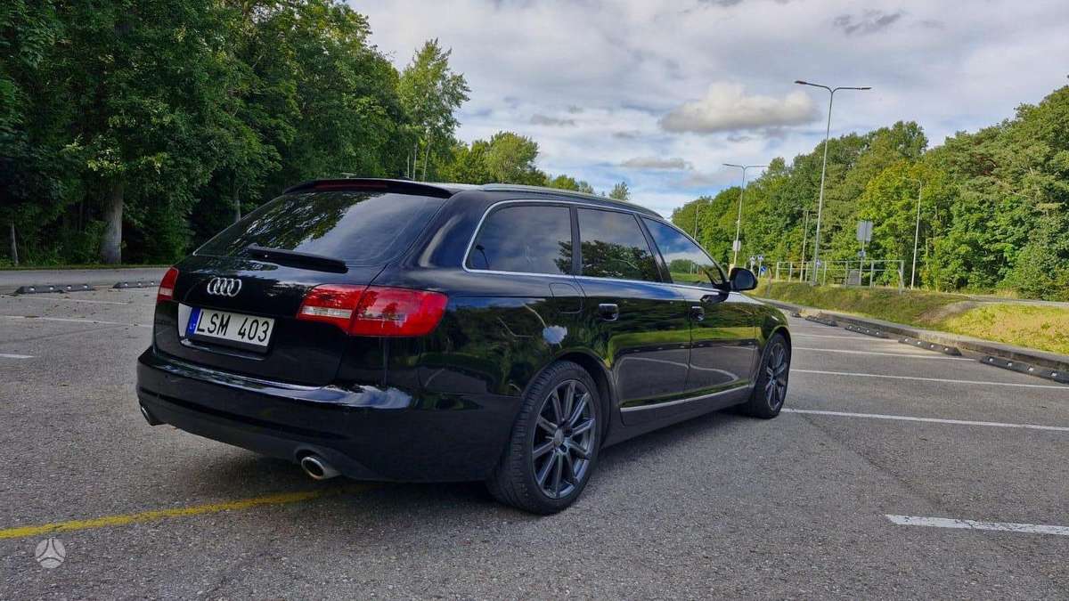Audi A6 2010 — engine 2967 cm³, 239 HP (176kW)