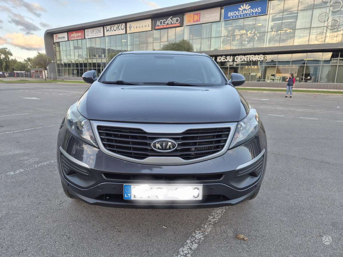 Kia Sportage 2012 — engine 1685 cm³, 116 HP (85kW)