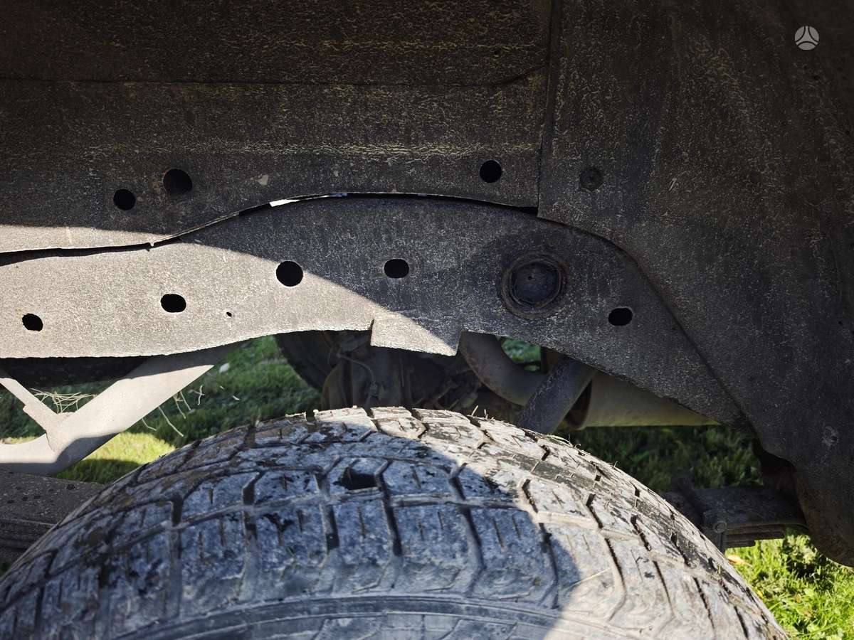 Mitsubishi L200 2010 — photo 10