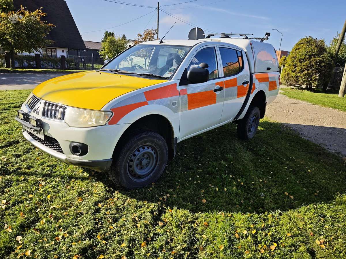 Mitsubishi L200 2010 — photo 8