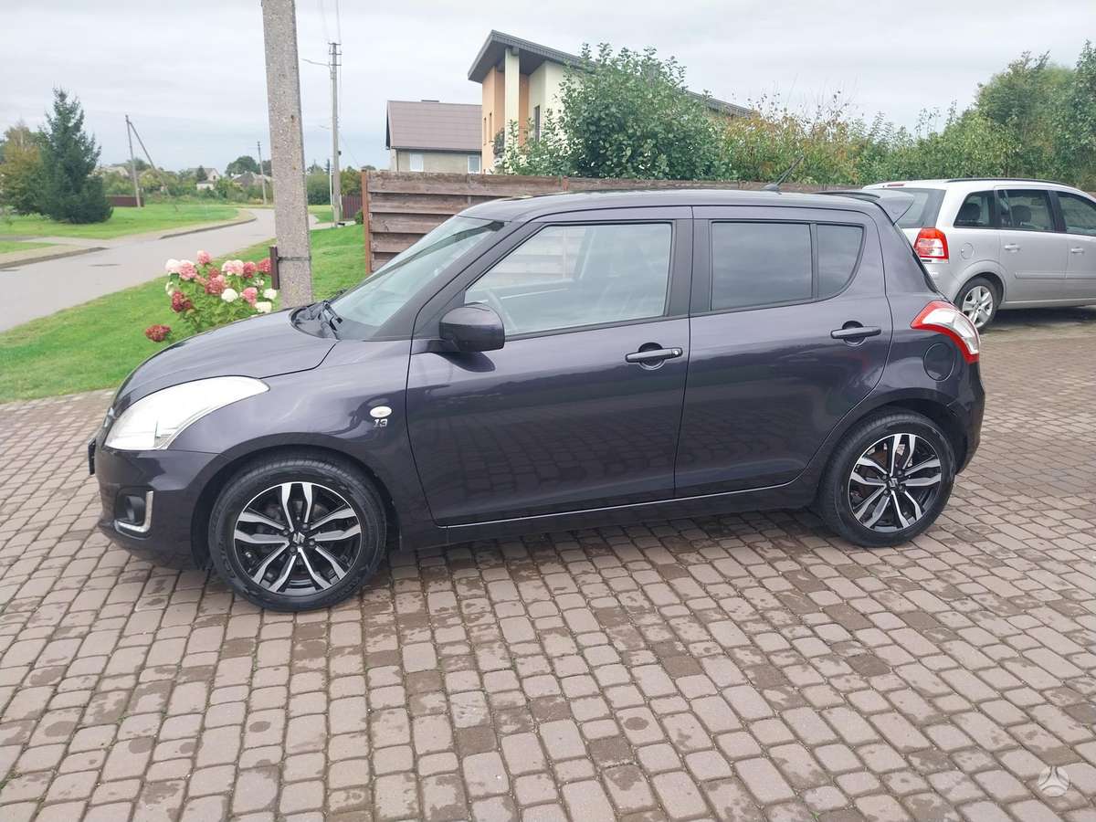 Suzuki Swift 2015 — rear view