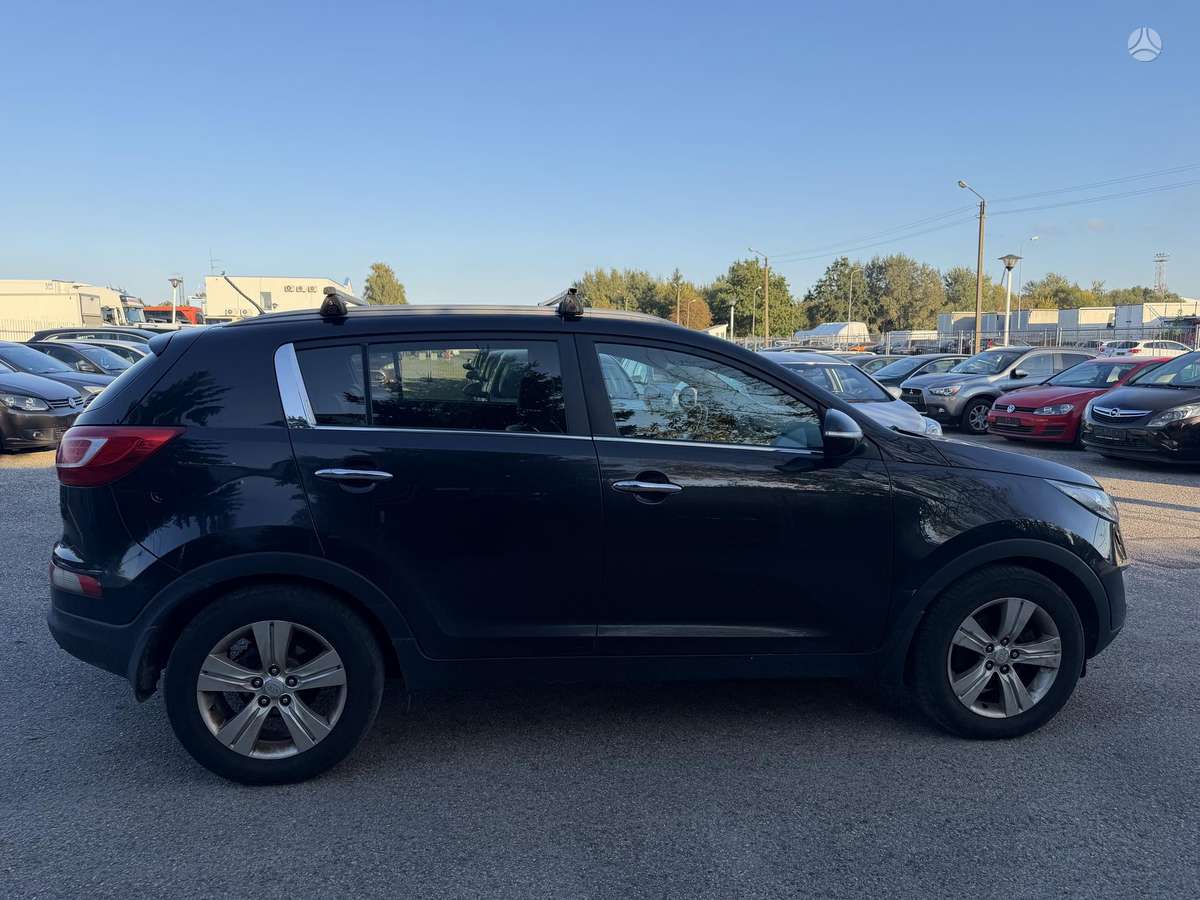Kia Sportage 2011 — engine 1685 cm³, 116 HP (85kW)