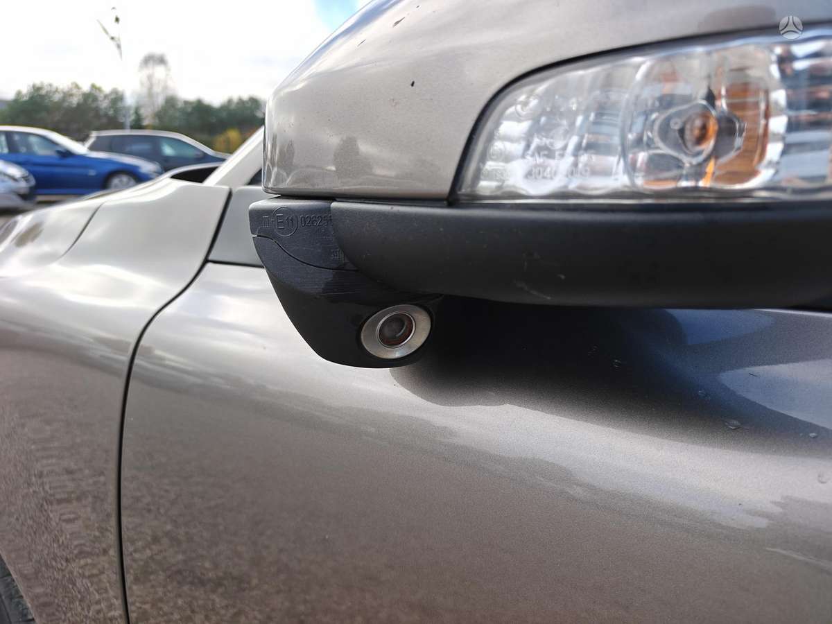 Volvo V70 2009 — photo 27
