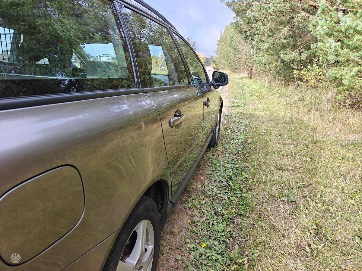 Volvo V70 2009 — photo 9