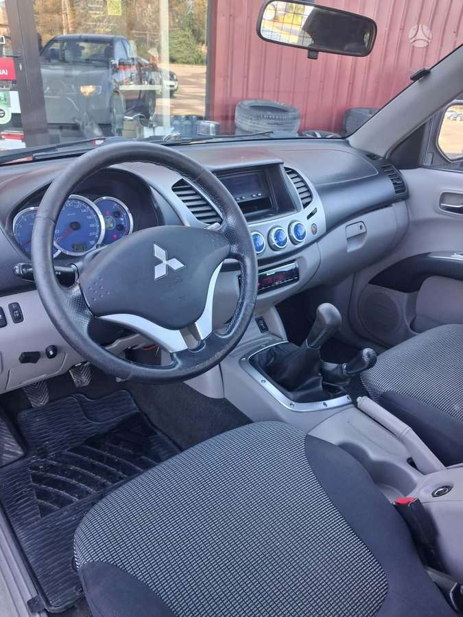 Mitsubishi L200 2008 — photo 10