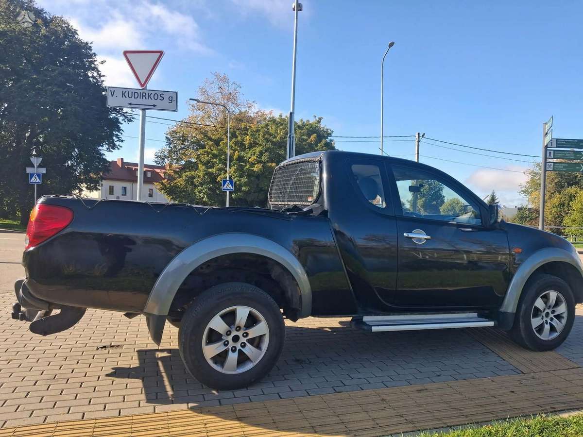 Mitsubishi L200 2008 — photo 11