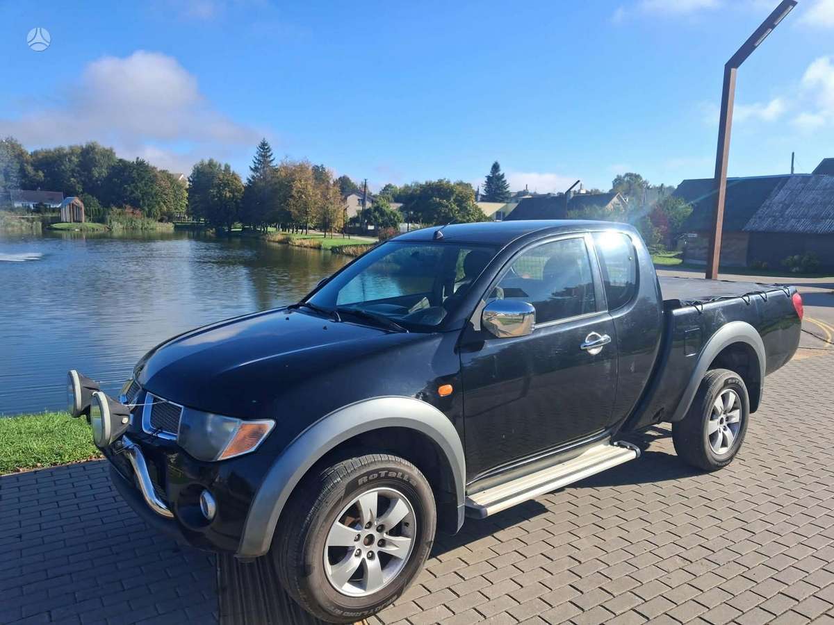Mitsubishi L200 2008 — photo 13