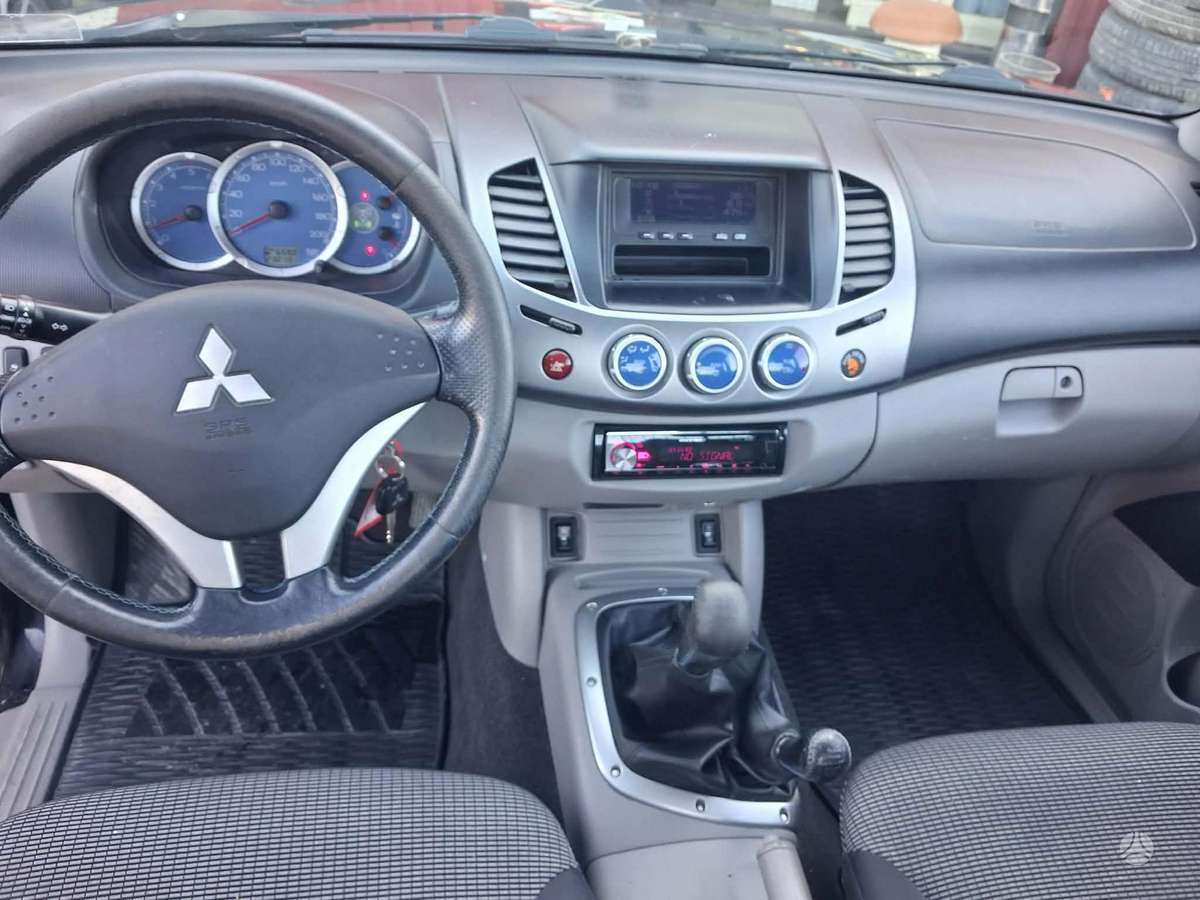 Mitsubishi L200 2008 — photo 14