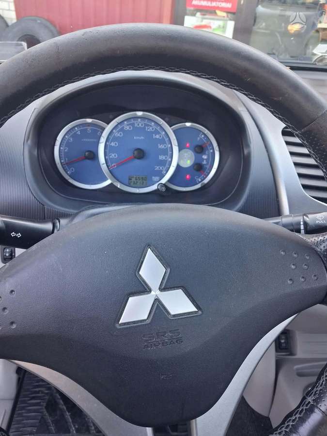 Mitsubishi L200 2008 — photo 21
