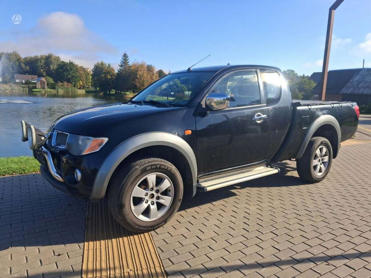 Mitsubishi L200 2008 — photo 7
