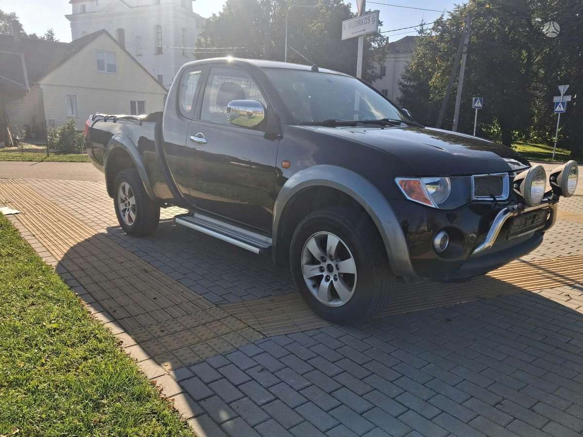 Mitsubishi L200 2008 — photo 9