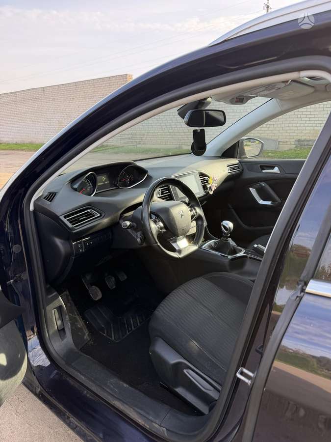 Peugeot 308 2014 — photo 11